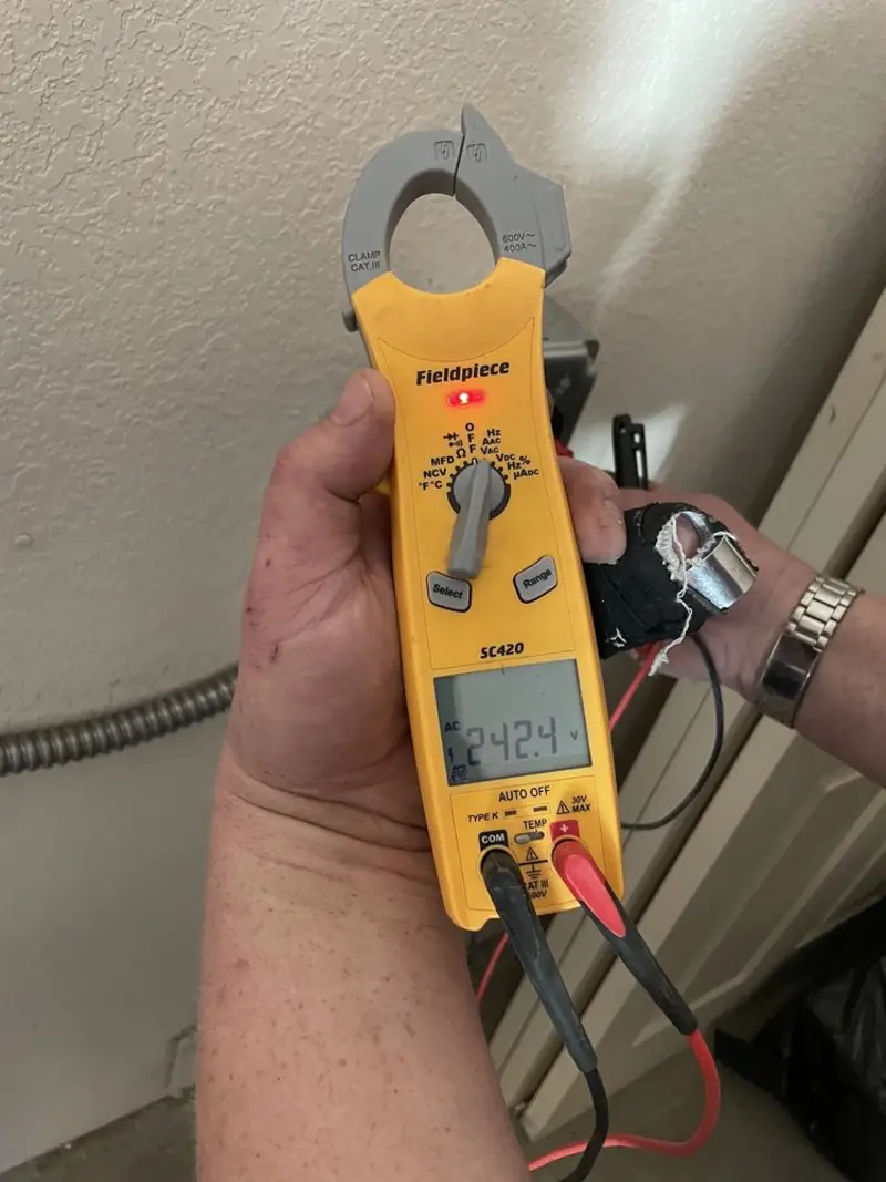 Voltage testing with clamp meter during Circuit Breaker Repair in Riverdale Park